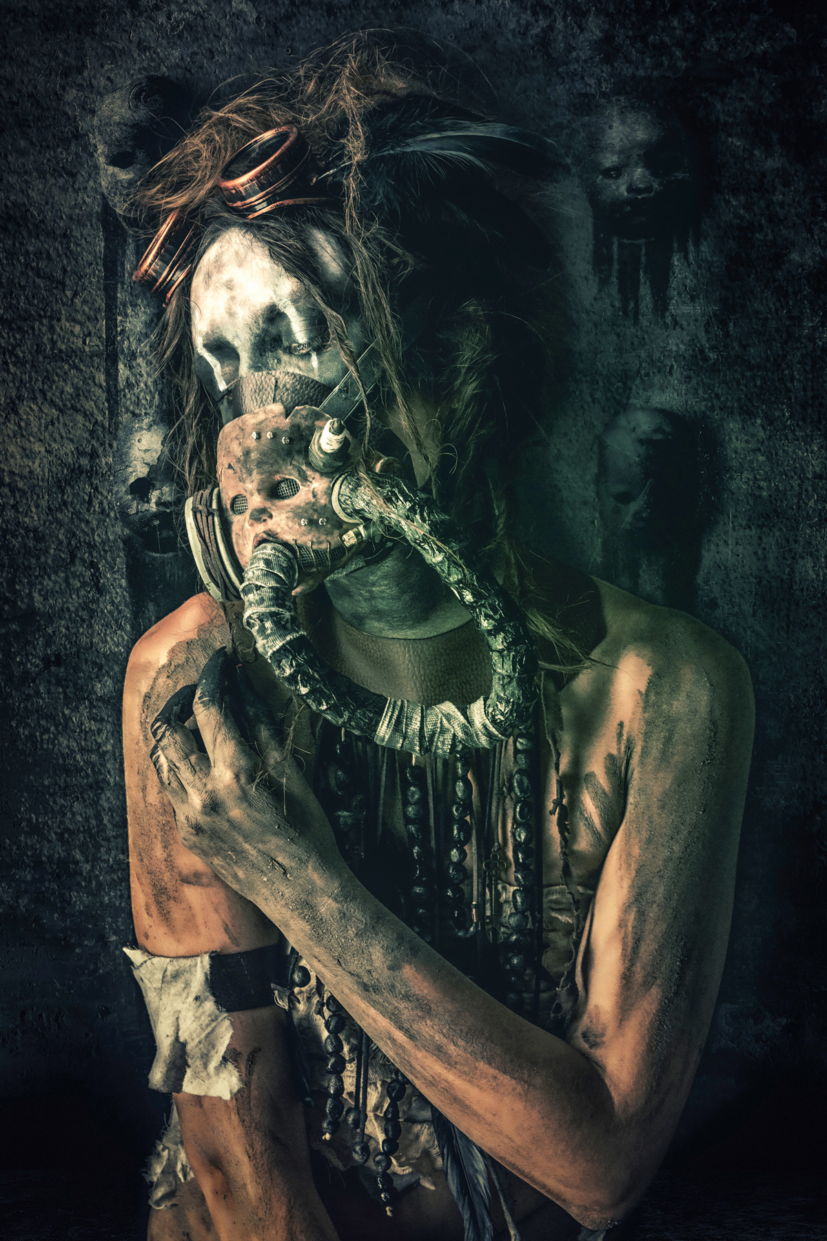 A dark post-apocalyptic portrait of a figure wearing a weathered gas mask with hoses and copper goggles, with grime-covered skin and long dark hair, set against a wall adorned with severed doll heads.